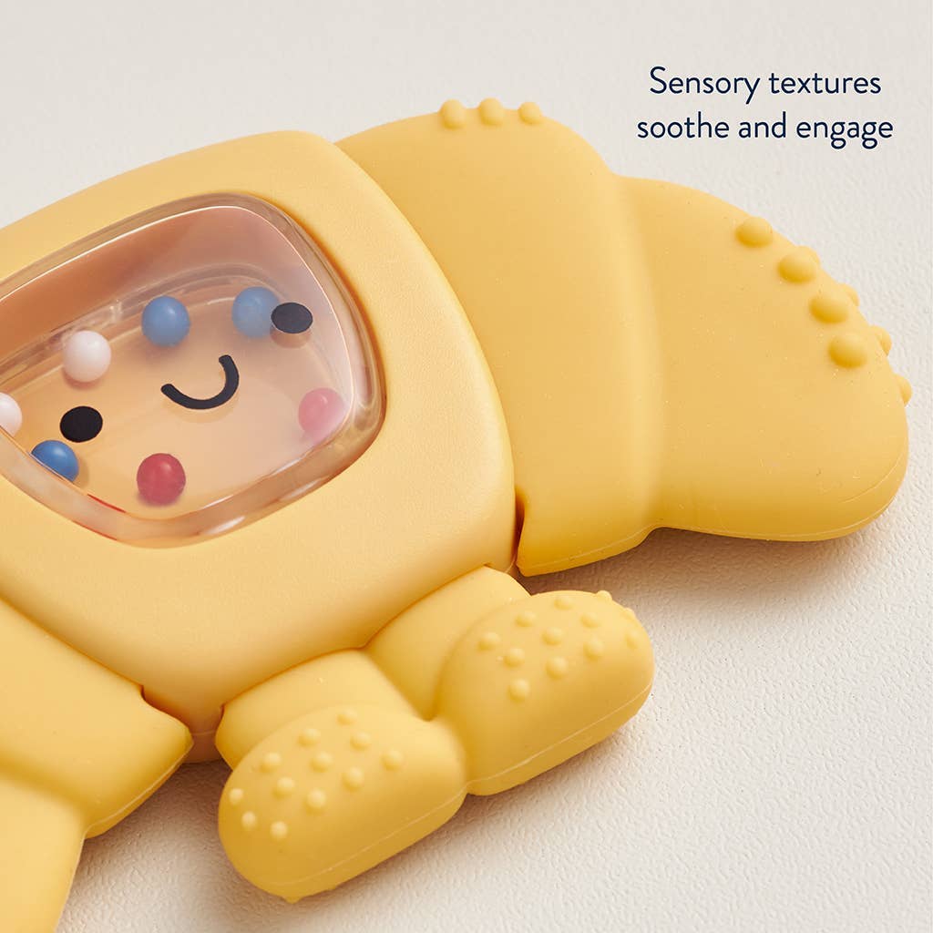 Yellow soft teether with colorful beads inside, on a light background