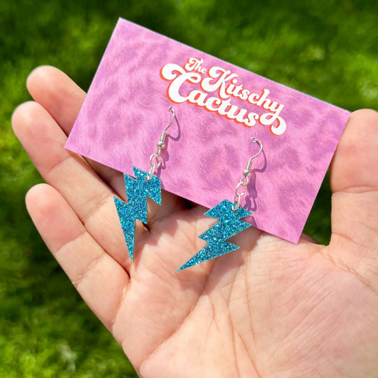 The Kitschy Cactus - Star Man (mini)-Blue Glitter Lightning Bolt Earrings