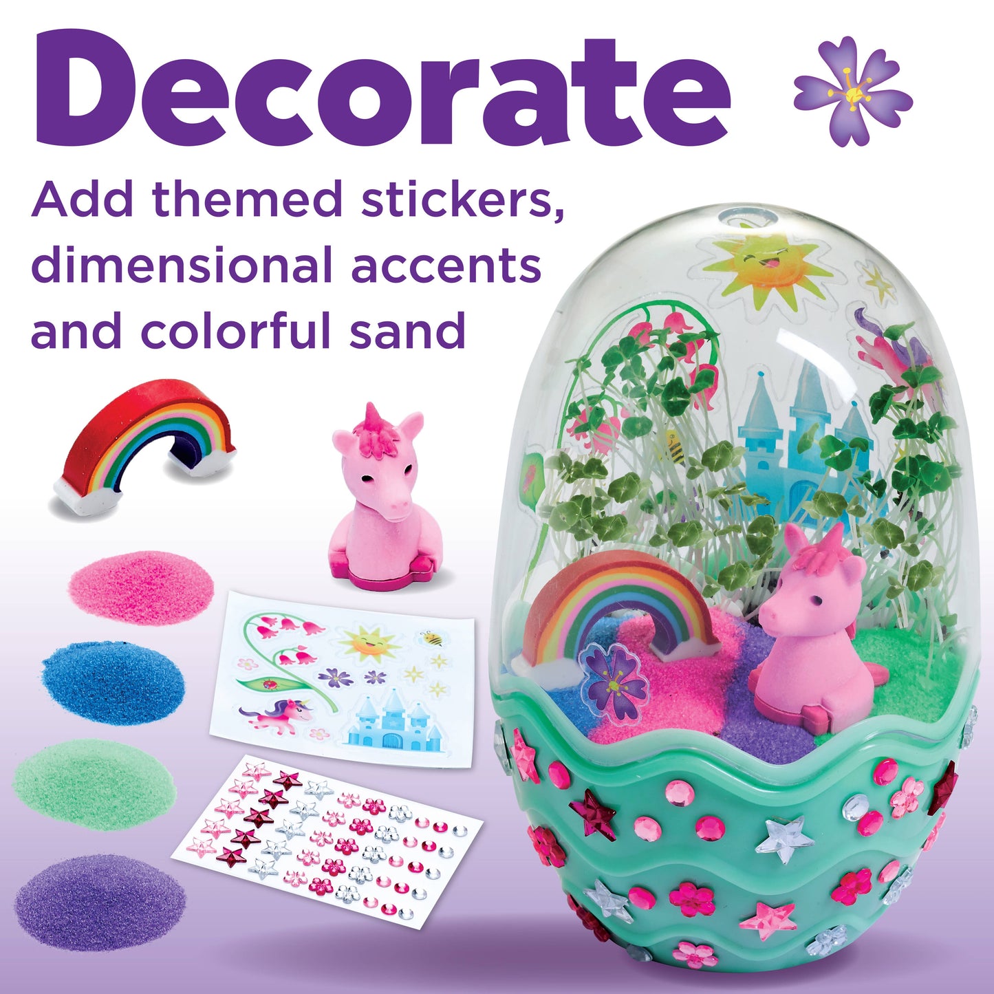 Decorative toy egg with unicorn, sand, and stickers on a white background